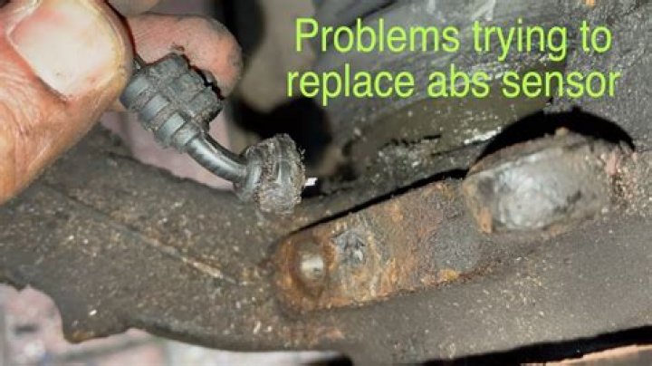 Can a broken ABS sensor cause transmission problems?