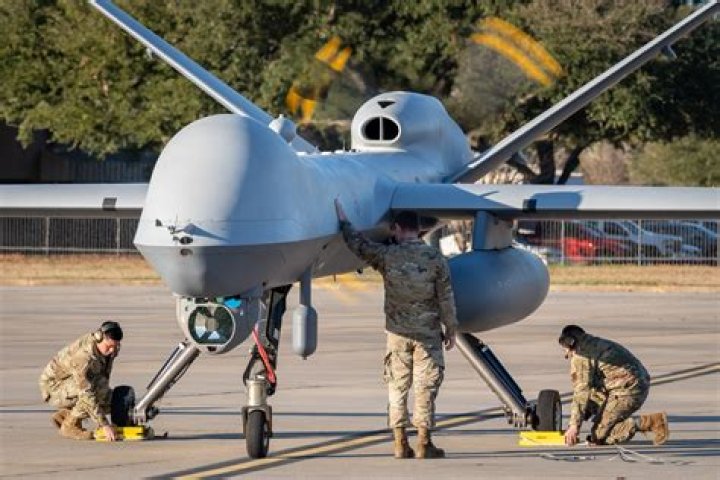 Can military take pictures on base?
