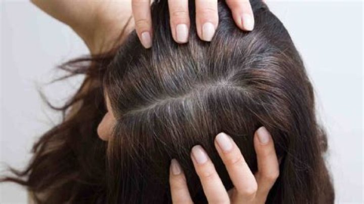Can white hair become black naturally?