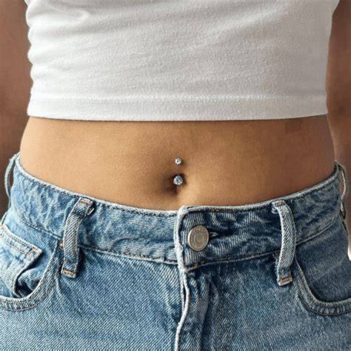 How can I clean my deep belly button?