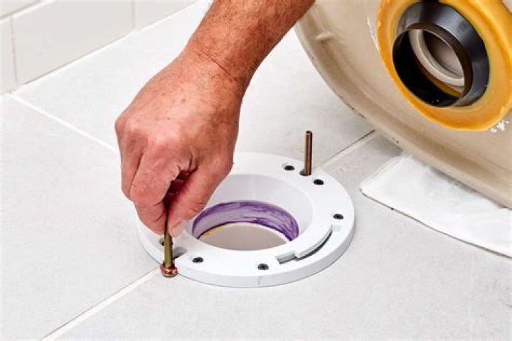 How do I get my toilet white again?