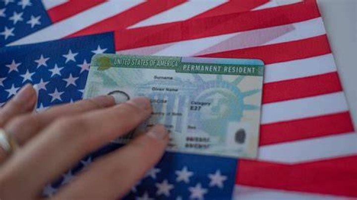 How do I keep my green card if I live abroad?