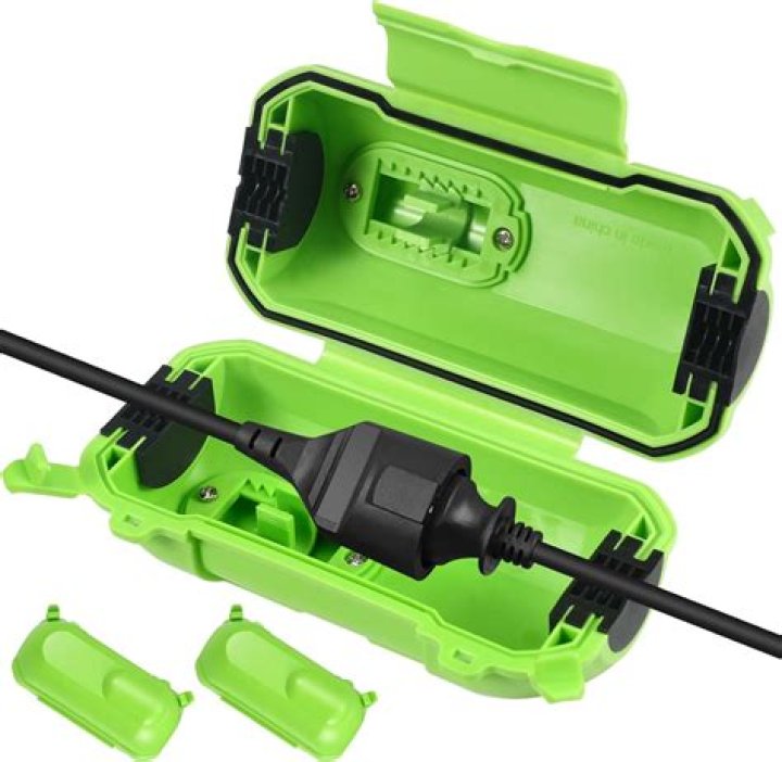 How do I protect my outdoor extension cord plugs?