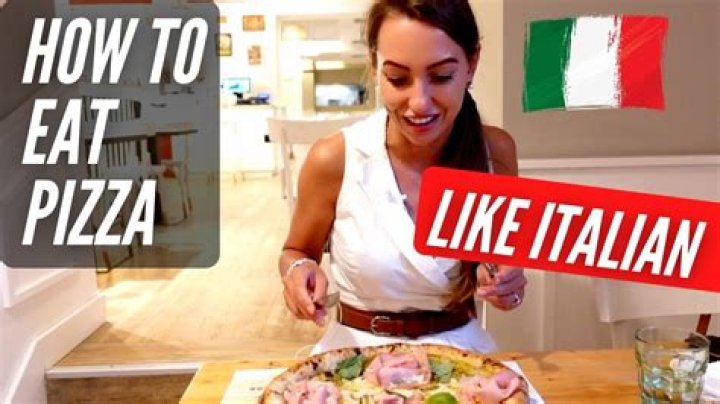 How do Italians eat pizza in Italy?
