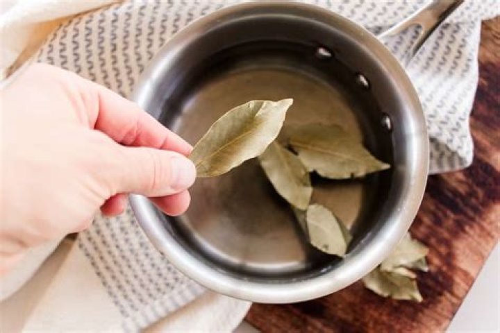 How do you apply bay leaf water to your hair?