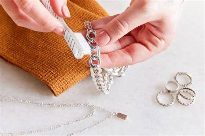 How do you clean a sterling silver chain that turned black?