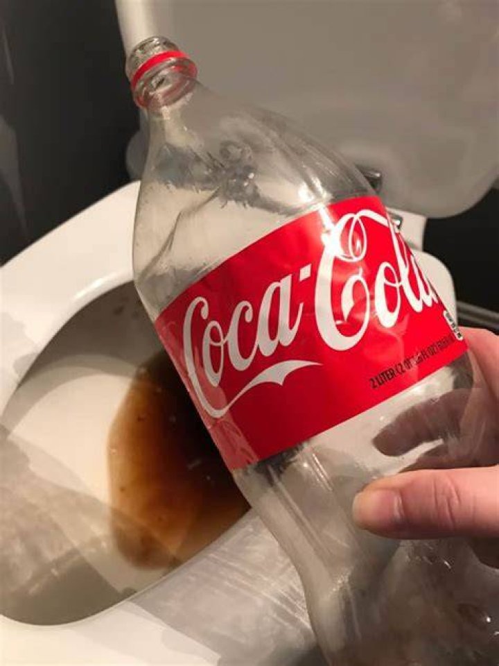 How do you clean a toilet with Coke?
