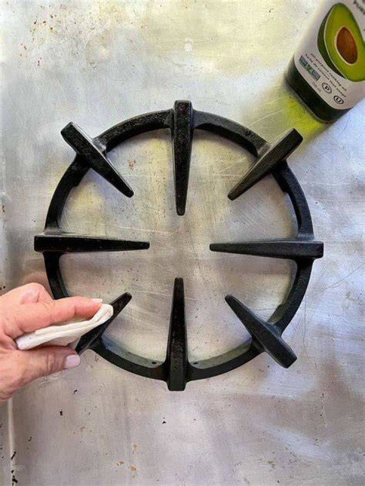 How do you deep clean cast iron stove grates?