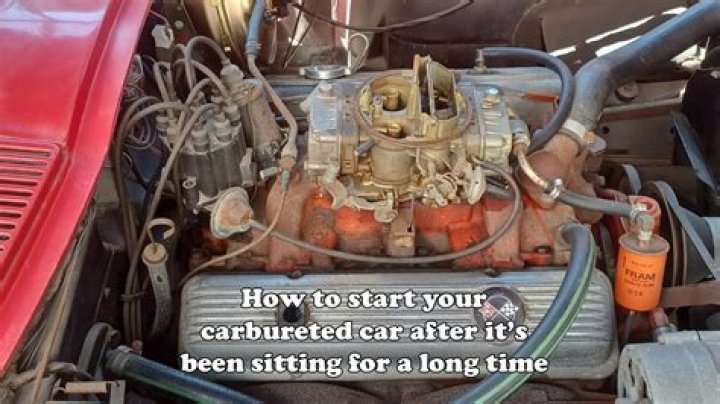 How do you start a warm carbureted engine?