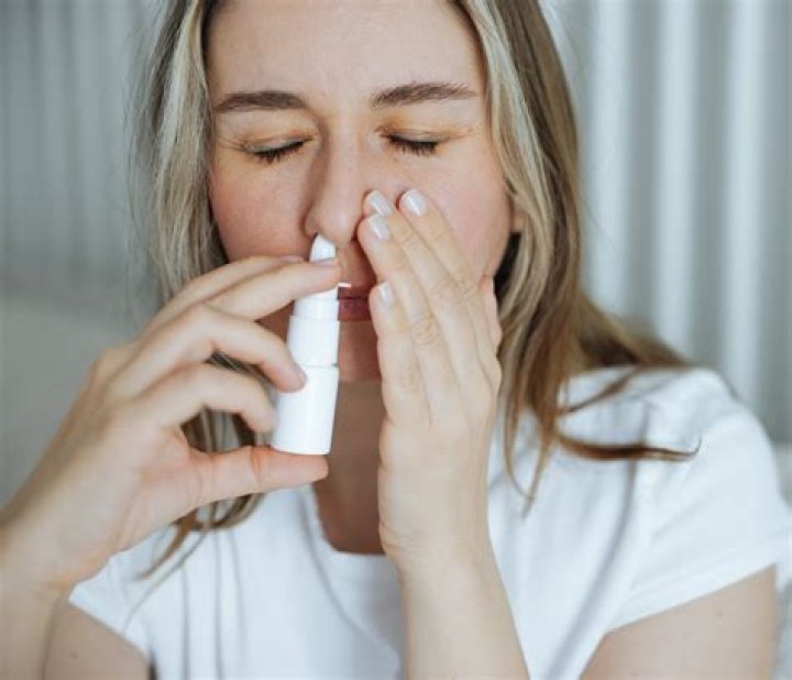 How do you use spray sanitizer on fabric?