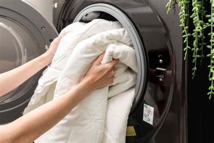 How do you wash and dry a comforter without it getting lumpy?