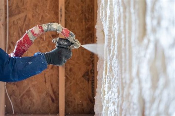 How thick can spray foam be applied?
