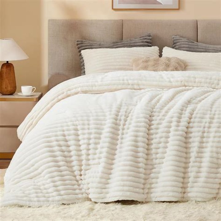 Is a comforter warmer than a blanket?