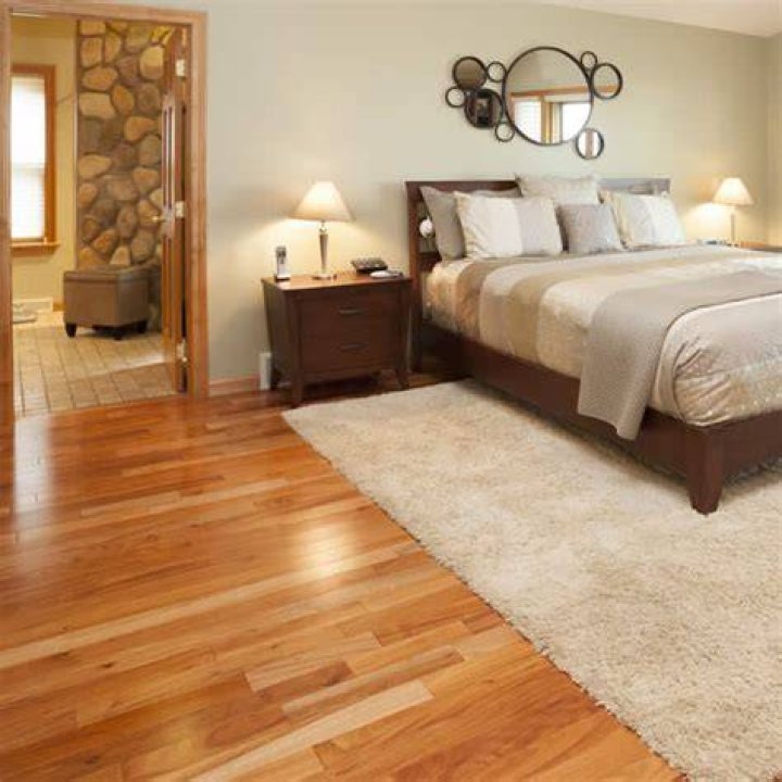 Is carpet better than hardwood in bedroom?