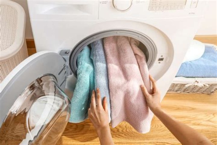 Is it okay to wash towels with bedding?