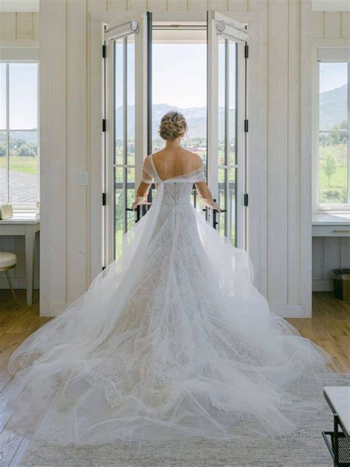 Should your shoes show in your wedding dress?