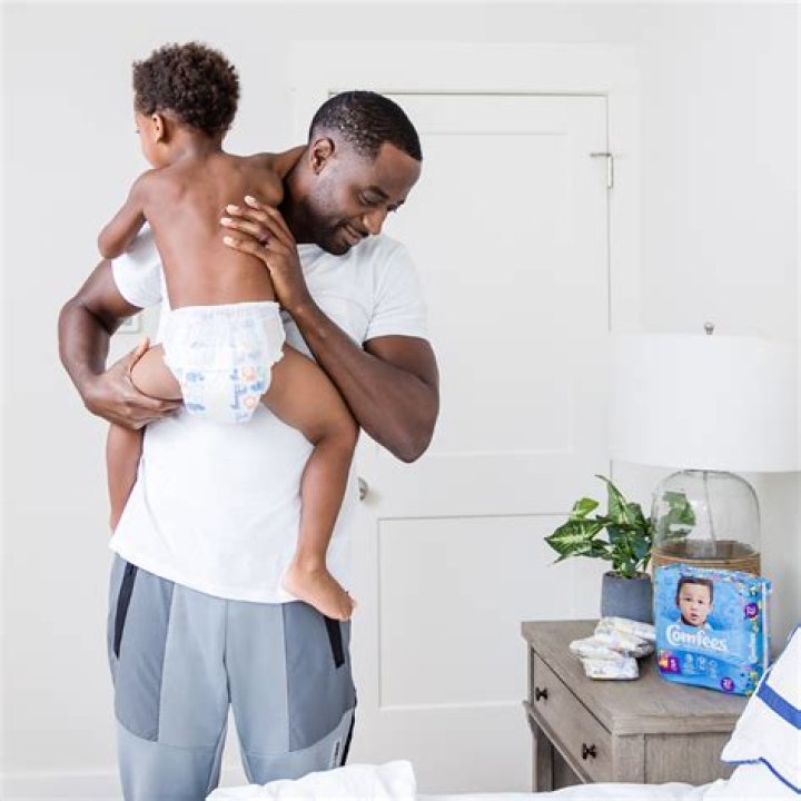 What age should a child be out of nappies at night?