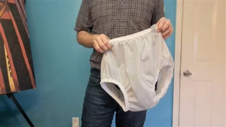 What do you soak cloth diapers in before washing?
