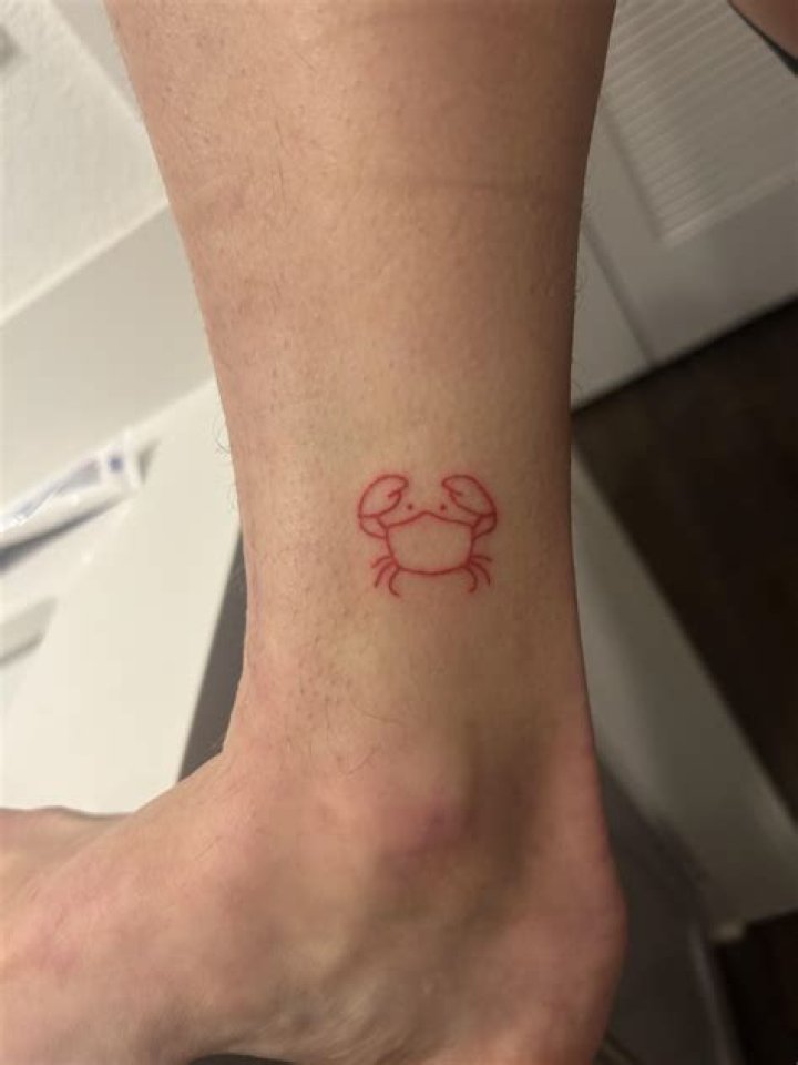 What does a crab tattoo mean?