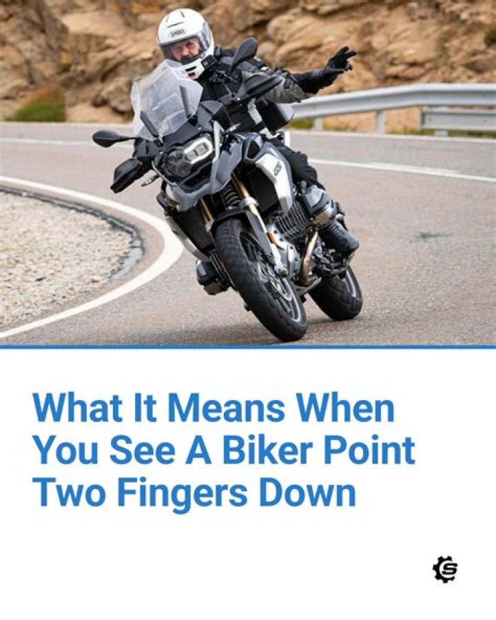What does it mean when bikers point two fingers down?