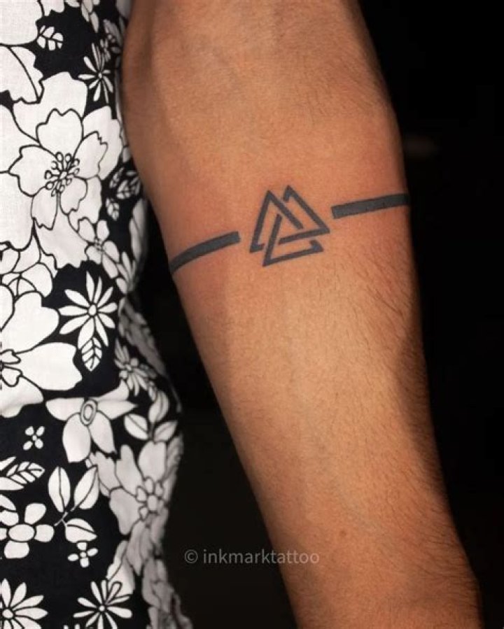 What does the 3 triangle tattoo mean?