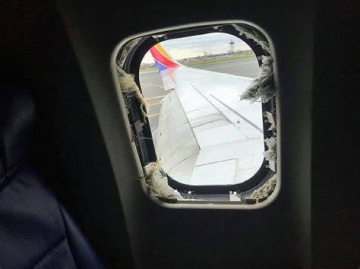 What happens if a window breaks on an airplane?