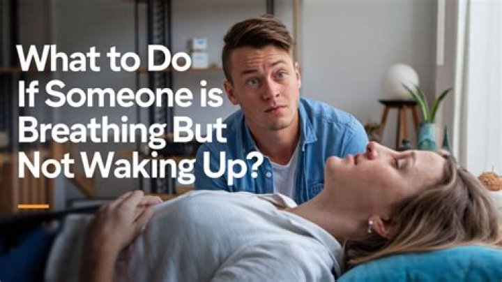 What to do if someone is breathing but not waking up?