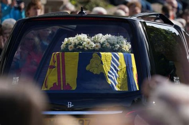Which way does a coffin go in a hearse?