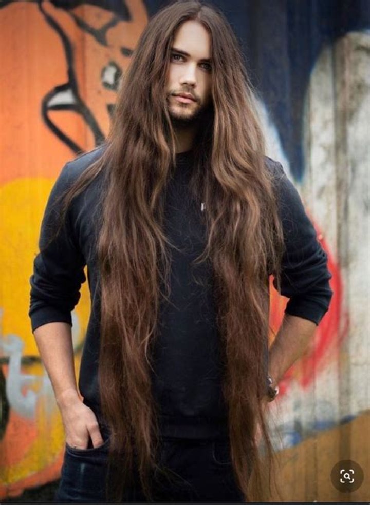 Who is the guy with long hair in AOT?