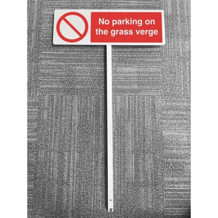 Who owns the grass verge outside my property?