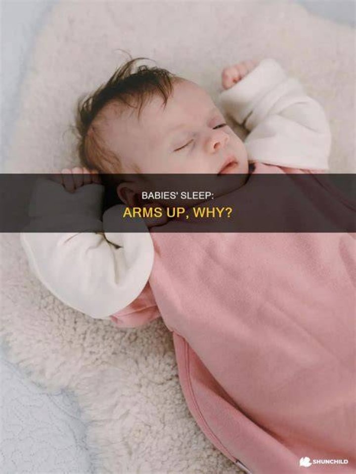 Why do babies arms stay up?