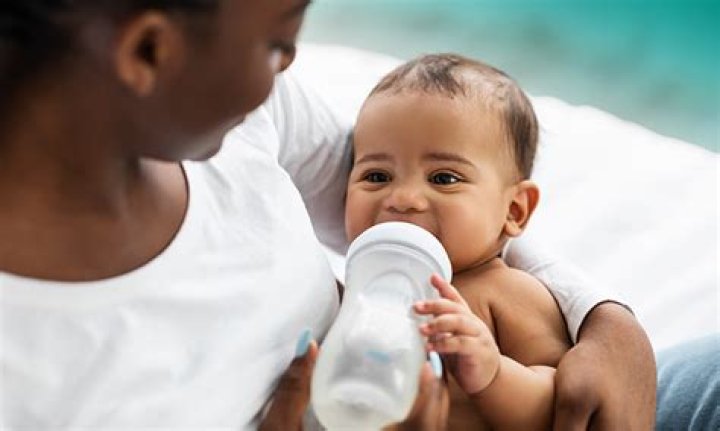 Why do babies hold your finger when feeding?