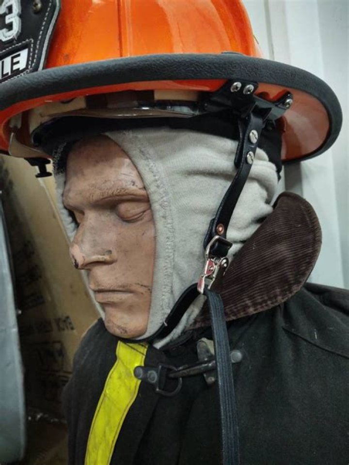 Why do firefighters wear leather helmets?