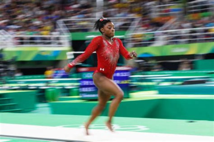 Why do gymnasts run with straight arms?