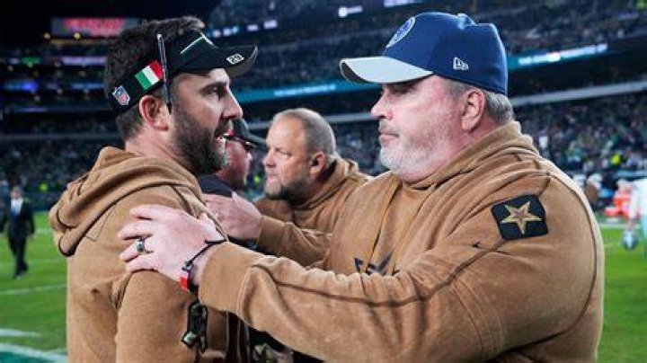 Why do NFL coaches cover their mouth?