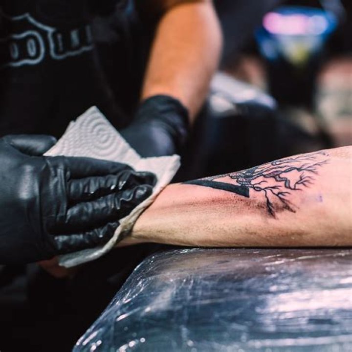 Why do tattoos need touch ups?