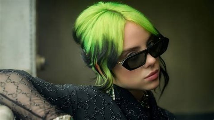 Why does Billie Eilish green hair?